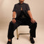 La Chelle Shirt Model Sitting in chair
