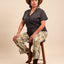 La Feli Shirt Model on Stool