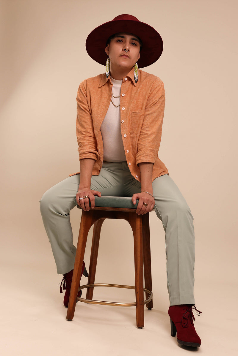 La Naranja Shirt Model on Stool